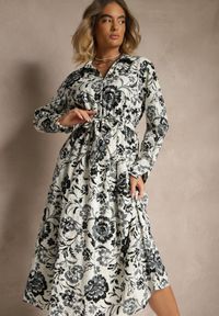 Renee - Niebieska Wiskozowa Sukienka w Kwiatowy Wzór o Koszulowym Kroju z Paskiem Zelkiona. Okazja: na co dzień, na spotkanie biznesowe. Kolor: niebieski. Materiał: wiskoza. Wzór: kwiaty. Typ sukienki: koszulowe. Styl: biznesowy, klasyczny, elegancki, casual #4
