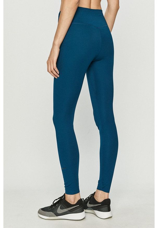 Nike - Legginsy. Kolor: niebieski. Materiał: tkanina, dzianina, skóra, włókno. Technologia: Dri-Fit (Nike)
