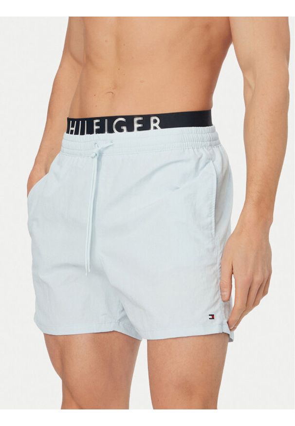 TOMMY HILFIGER - Tommy Hilfiger Szorty kąpielowe UM0UM03749 Niebieski jasny Regular Fit. Kolor: niebieski. Materiał: syntetyk