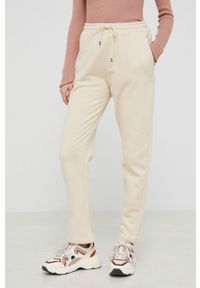 Answear Lab Spodnie damskie kolor beżowy. Stan: podwyższony. Kolor: beżowy. Materiał: dzianina. Wzór: gładki