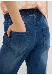 bonprix - Jegginsy mid waist, flared. Kolor: niebieski