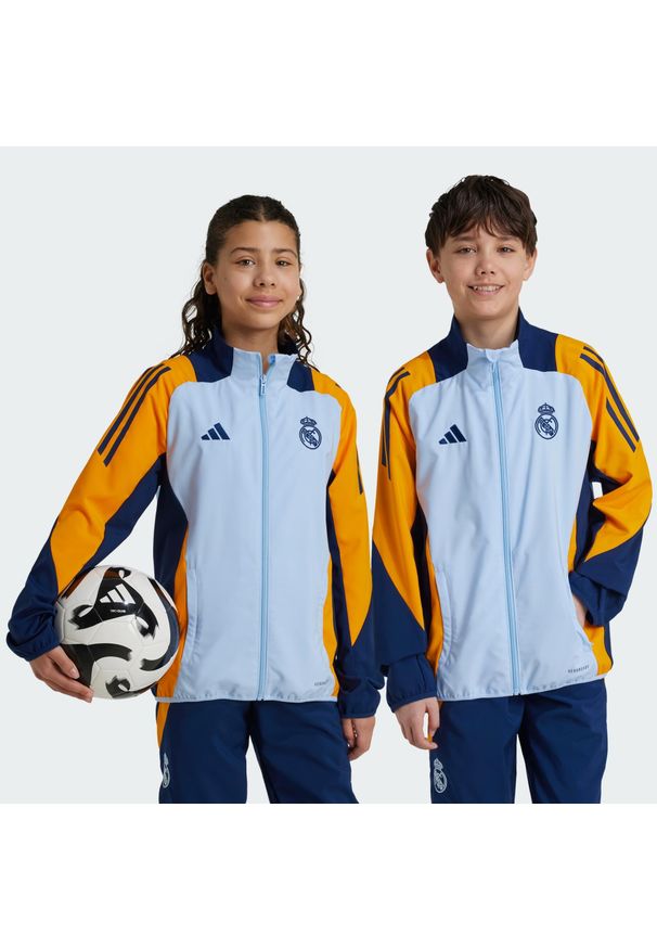 Adidas - Bluza Real Madrid Tiro 24 Competition Presentation Kids. Kolor: pomarańczowy, niebieski, wielokolorowy. Materiał: materiał