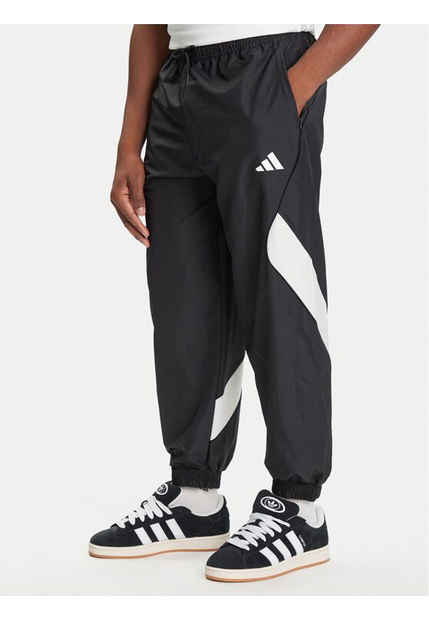 Adidas - adidas Spodnie dresowe Stadium JN1830 Czarny Loose Fit. Kolor: czarny. Materiał: syntetyk