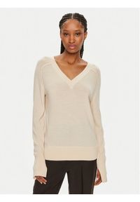 Calvin Klein Sweter K20K207573 Beżowy Regular Fit. Kolor: beżowy. Materiał: wełna