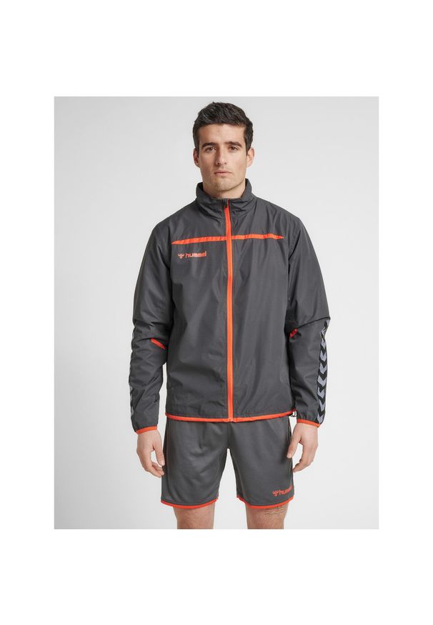 Kurtka Hummel hmlAUTHENTIC Training. Kolor: szary, wielokolorowy, pomarańczowy. Materiał: poliester. Sport: fitness, piłka ręczna