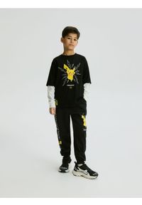 Reserved - Longsleeve Pokémon - czarny. Kolor: czarny. Materiał: dzianina, bawełna. Długość rękawa: długi rękaw #1