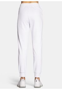 Spodnie dresowe damskie białe Armani Exchange 8NYPBA YJE5Z 1100. Kolor: biały. Materiał: dresówka