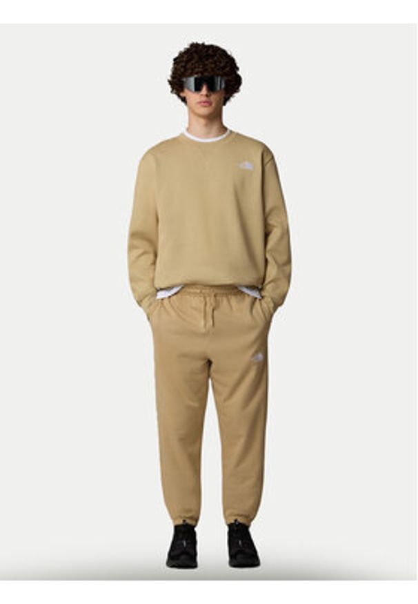 The North Face Bluza Essential NF0A89ET Beżowy Relaxed Fit. Kolor: beżowy. Materiał: syntetyk, bawełna