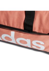 Adidas - adidas Torba Essentials Linear Duffel Bag Extra Small IL5765 Koralowy. Kolor: pomarańczowy. Materiał: materiał #3