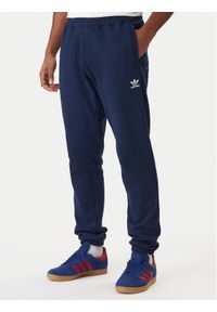 Adidas - adidas Spodnie dresowe Trefoil Essentials JD2423 Granatowy Slim Fit. Kolor: niebieski. Materiał: bawełna #1