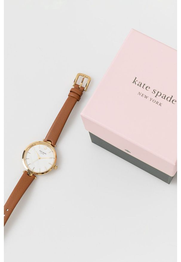 Kate Spade Zegarek damski kolor brązowy. Kolor: brązowy. Materiał: skóra, materiał