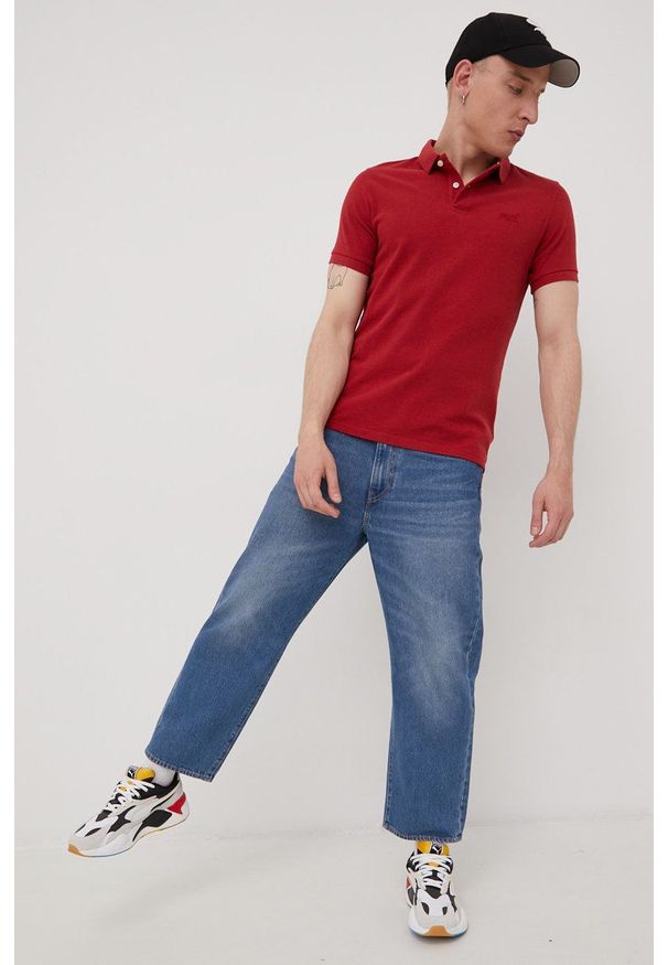 Superdry polo bawełniane kolor czerwony gładki. Typ kołnierza: polo. Kolor: czerwony. Materiał: bawełna. Długość: krótkie. Wzór: gładki