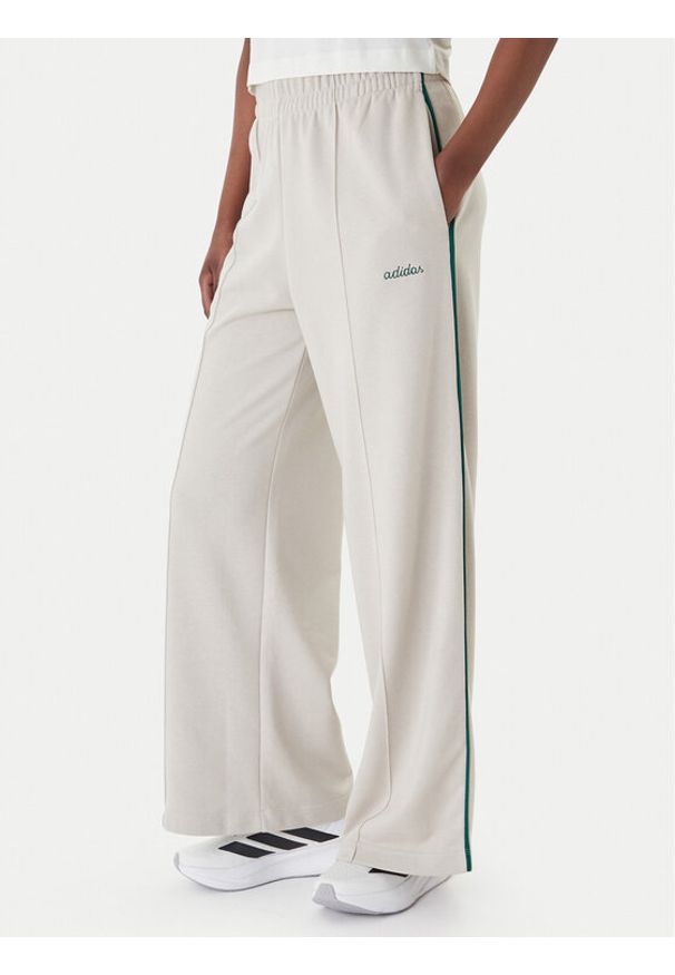 Adidas - adidas Spodnie dresowe Seasonal Essentials Colourpop JZ0192 Beżowy Regular Fit. Kolor: beżowy. Materiał: bawełna