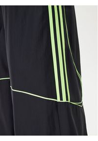 Adidas - adidas Spodnie dresowe Teamgeist adicolor JV7478 Czarny Oversize. Kolor: czarny. Materiał: syntetyk #4