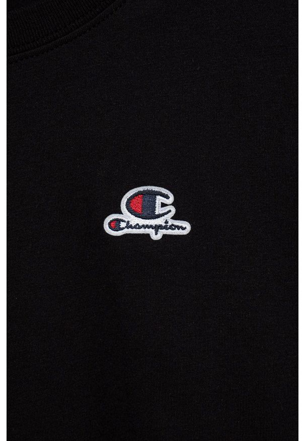 Champion t-shirt bawełniany dziecięcy kolor czarny. Kolor: czarny. Materiał: bawełna. Długość rękawa: krótki rękaw. Długość: krótkie. Wzór: aplikacja