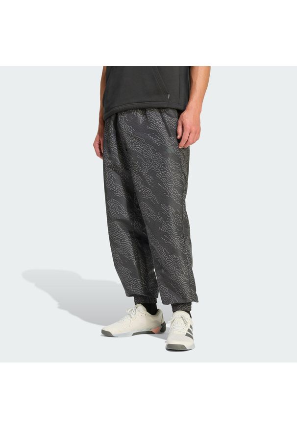 Adidas - Spodnie Power Workout Aop. Kolor: czarny, brązowy, szary, wielokolorowy. Materiał: materiał. Sport: fitness