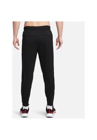 Spodnie sportowe damskie Nike Totality. Kolor: czarny. Materiał: materiał, syntetyk