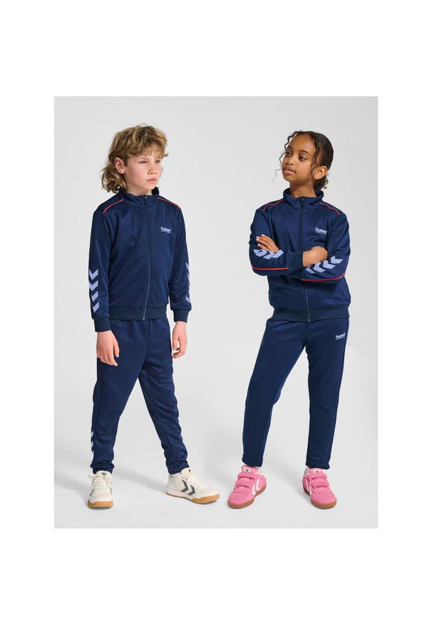 Dziecięcy dres Hummel. Kolor: niebieski, wielokolorowy, zielony. Materiał: dresówka. Styl: sportowy