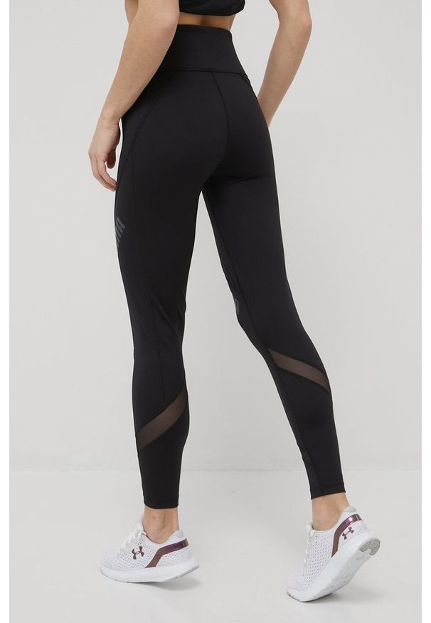 Puma legginsy treningowe Logo Eversculpt damskie kolor czarny z nadrukiem. Stan: podwyższony. Kolor: czarny. Materiał: skóra, materiał. Wzór: nadruk. Sport: fitness