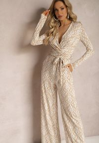 Renee - Beżowy Kopertowy Kombinezon z Paskiem w Talii i Ozdobnym Wzorem Mirannda. Kolor: beżowy. Materiał: materiał. Wzór: aplikacja. Styl: elegancki #3