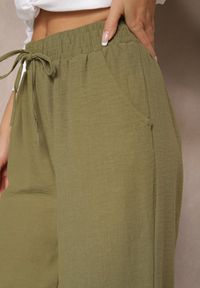 Renee - Zielone Szerokie Spodnie Palazzo High Waist z Ozdobnym Wiązaniem Arandiel. Okazja: na co dzień. Stan: podwyższony. Kolor: zielony. Materiał: jedwab. Styl: wizytowy, casual, street