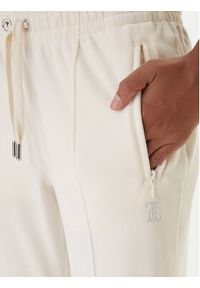 Juicy Couture Spodnie dresowe Tina JCWBJ225307 Beżowy Regular Fit. Kolor: beżowy. Materiał: syntetyk #3