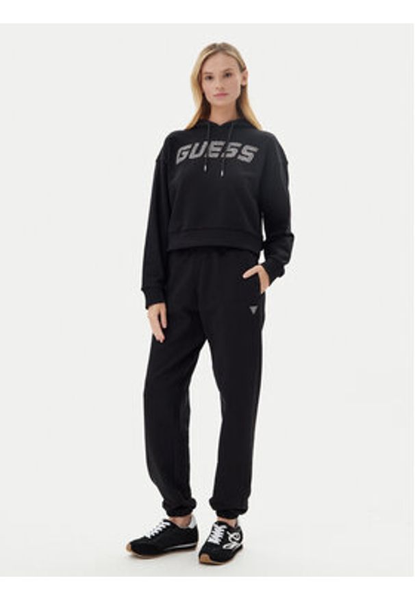 Guess Spodnie dresowe V5YB17 KCRP0 Czarny Regular Fit. Kolor: czarny. Materiał: bawełna