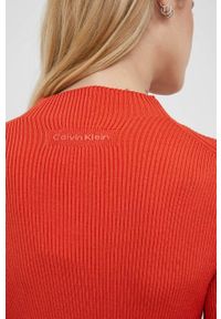 Calvin Klein sukienka kolor pomarańczowy mini dopasowana. Kolor: pomarańczowy. Materiał: dzianina, acetat. Długość rękawa: długi rękaw. Wzór: gładki. Typ sukienki: dopasowane. Długość: mini #3