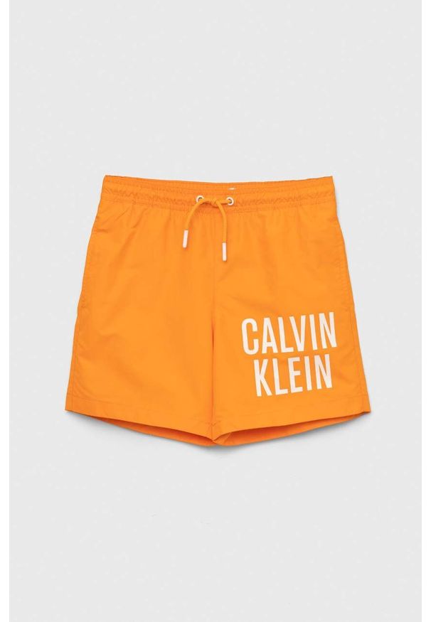 Calvin Klein Jeans szorty kąpielowe dziecięce kolor pomarańczowy. Kolor: pomarańczowy. Materiał: poliester, materiał. Wzór: nadruk