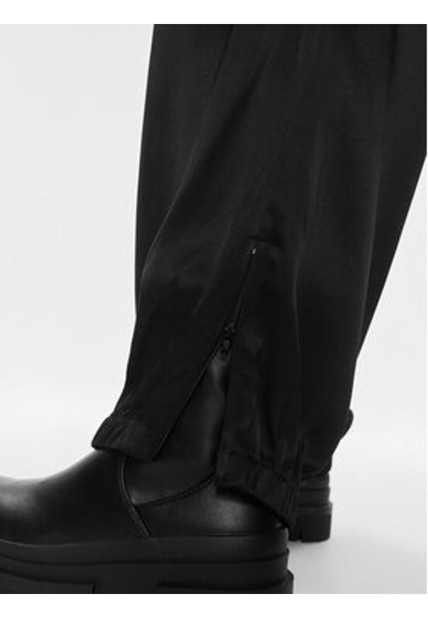 Herskind Spodnie materiałowe Edwin 4949985 Czarny Relaxed Fit. Kolor: czarny. Materiał: wiskoza