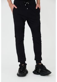 Balmain - BALMAIN Czarne męskie spodnie dresowe Ribbed Flock Sweatpants, Rozmiar L. Kolor: czarny. Materiał: dresówka