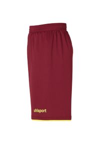 UHLSPORT - Krótki Uhlsport Club. Kolor: czerwony, wielokolorowy, żółty. Długość: krótkie. Sport: piłka nożna