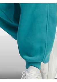 Adidas - adidas Spodnie dresowe ALL SZN Fleece IM0333 Niebieski Loose Fit. Kolor: niebieski. Materiał: bawełna