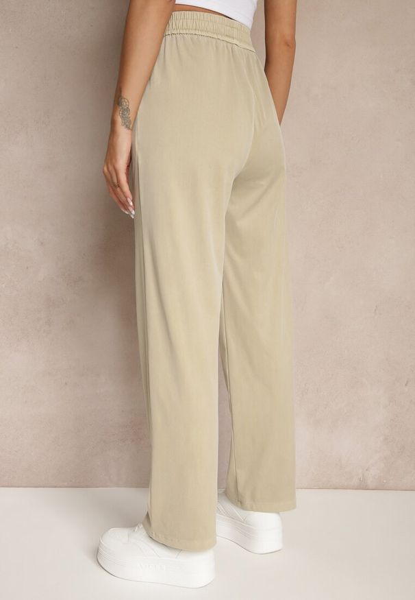 Renee - Beżowe Spodnie z Wiskozą High Waist z Ozdobną Aplikacją Frovanna. Okazja: na co dzień. Stan: podwyższony. Kolor: beżowy. Materiał: wiskoza. Wzór: aplikacja. Styl: klasyczny, casual, elegancki