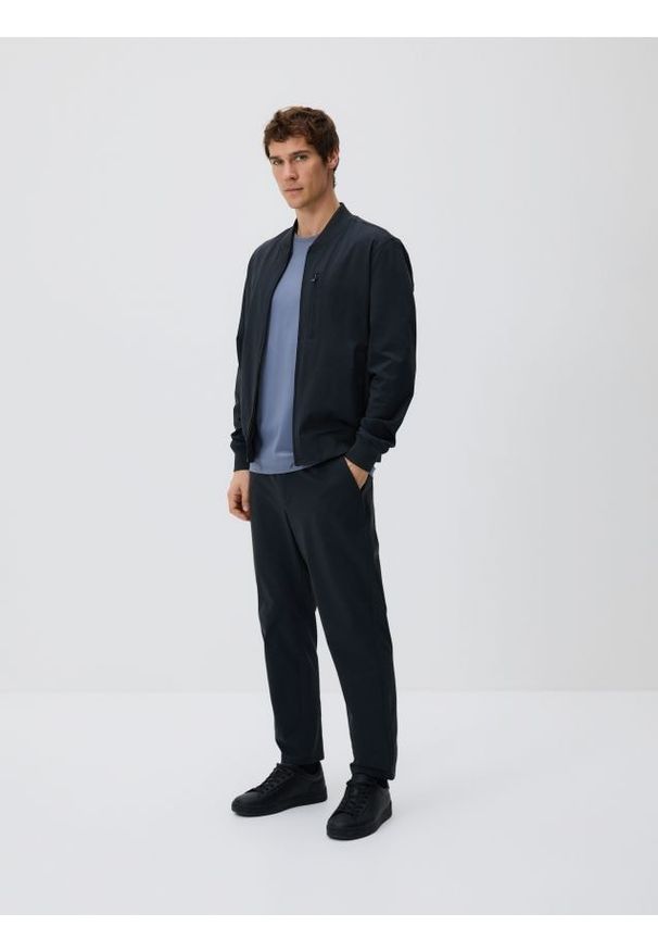 Reserved - Spodnie chino slim fit - czarny. Kolor: czarny. Materiał: dzianina