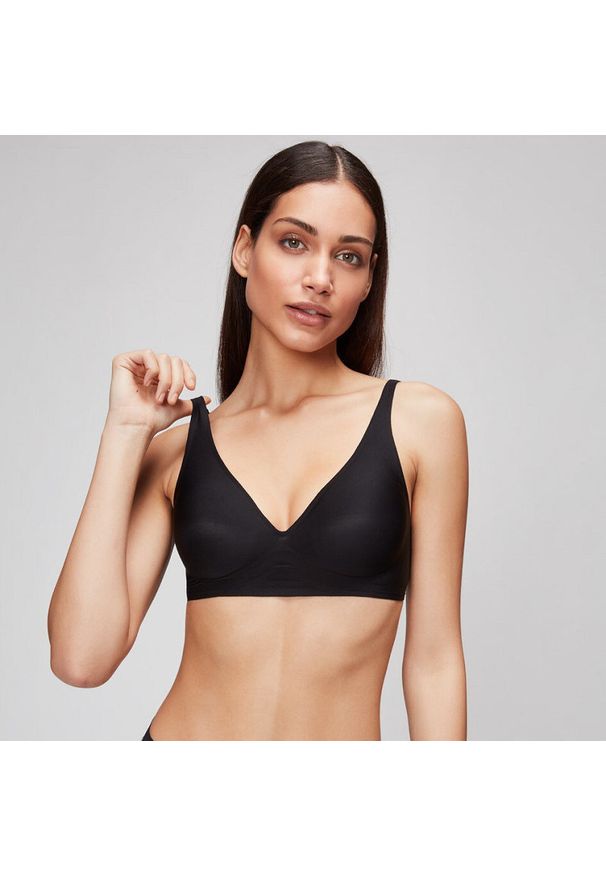 Intica - Biustonosz z głębokim dekoltem do codziennych stylizacji Jacquelin. Kolor: różowy. Materiał: materiał