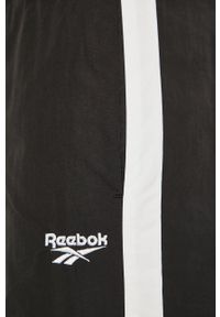 Reebok Classic - Spodnie. Kolor: czarny. Materiał: tkanina, bawełna, nylon, materiał. Wzór: gładki #2