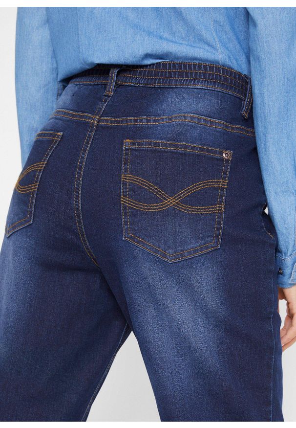 bonprix - Dżinsy ocieplane, straight, mid waist. Kolor: niebieski