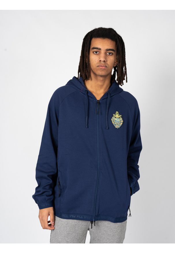 Fila Bluza "Trassmen" | FAM0375 | Mężczyzna | Granatowy. Okazja: na co dzień. Typ kołnierza: kaptur. Kolor: niebieski. Materiał: bawełna, poliester. Wzór: aplikacja. Styl: casual