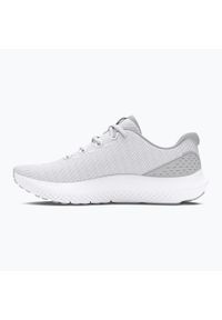 Under Armour - Buty sportowe dla kobiet UNDER ARMOUR UA CHARGED SURGE 4. Kolor: biały