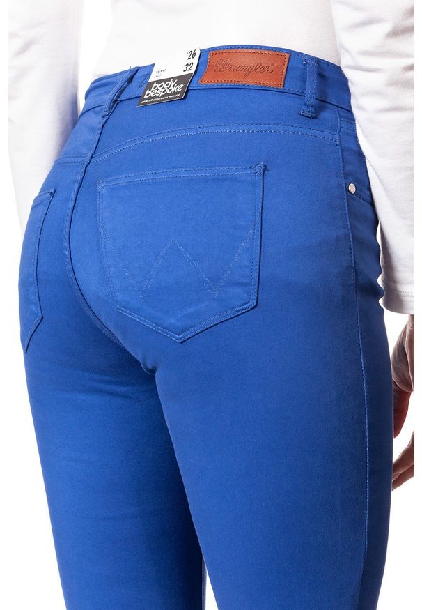 Wrangler - SPODNIE WRANGLER DAMSKIE SKINNY CROP TURKISH SEA W28MHL291 112128460. Materiał: materiał