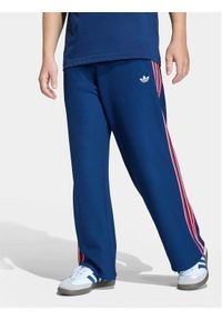Adidas - adidas Spodnie dresowe Firebird Double Knit KD7825 Granatowy Loose Fit. Kolor: niebieski. Materiał: syntetyk #1
