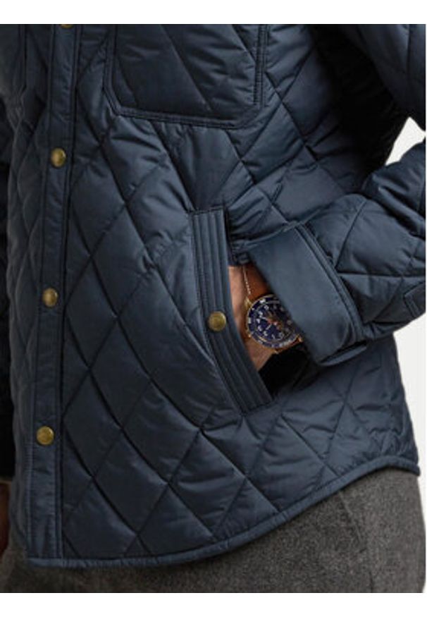 Polo Ralph Lauren Kurtka przejściowa 710876085003 Granatowy Regular Fit. Typ kołnierza: polo. Kolor: niebieski. Materiał: syntetyk