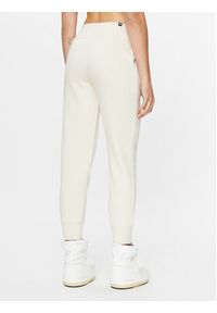 Puma Spodnie dresowe Ess 586841 Biały Regular Fit. Kolor: biały. Materiał: syntetyk, dresówka, bawełna #4