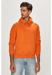 Calvin Klein Jeans - Bluza bawełniana. Okazja: na co dzień. Typ kołnierza: kaptur. Kolor: pomarańczowy. Materiał: bawełna. Styl: casual #1