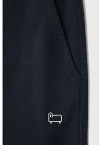 Woolrich Spodnie męskie kolor granatowy gładkie. Kolor: niebieski. Materiał: dzianina. Wzór: gładki