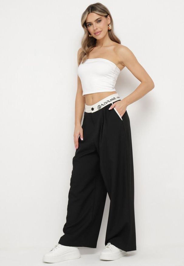 Born2be - Czarne Szerokie Palazzo Spodnie z Wysokim Stanem Zapinane na Zamek i Guziki Folina. Okazja: na spotkanie biznesowe, na co dzień. Stan: podwyższony. Kolekcja: plus size. Kolor: czarny. Materiał: bawełna. Styl: elegancki, biznesowy, casual, wizytowy