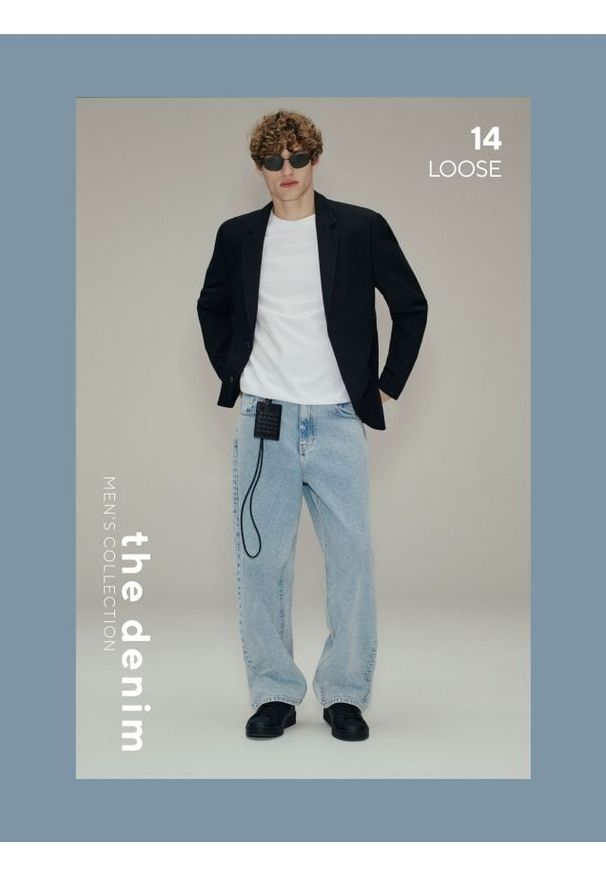 Reserved - Jeansy loose z efektem sprania - niebieski. Kolor: niebieski