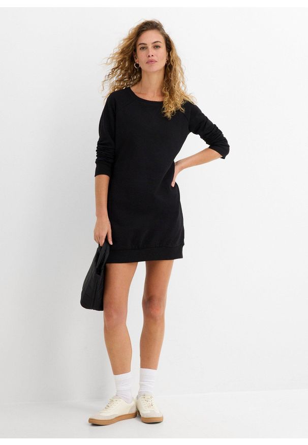bonprix - Sukienka dresowa z miękkiego materiału frotte. Kolor: czarny. Materiał: materiał, dresówka. Długość rękawa: raglanowy rękaw. Wzór: prążki