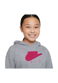 Bluza sportowa dla dziewcząt Nike Air DA1173. Typ kołnierza: kaptur. Materiał: dresówka, bawełna, dzianina, materiał, poliester. Długość: krótkie. Wzór: gładki. Sport: fitness